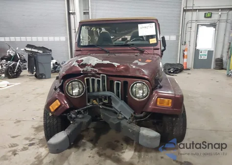2002 Jeep Wrangler Sahara from USA, damaged, VIN 1J4FA59S32P772909